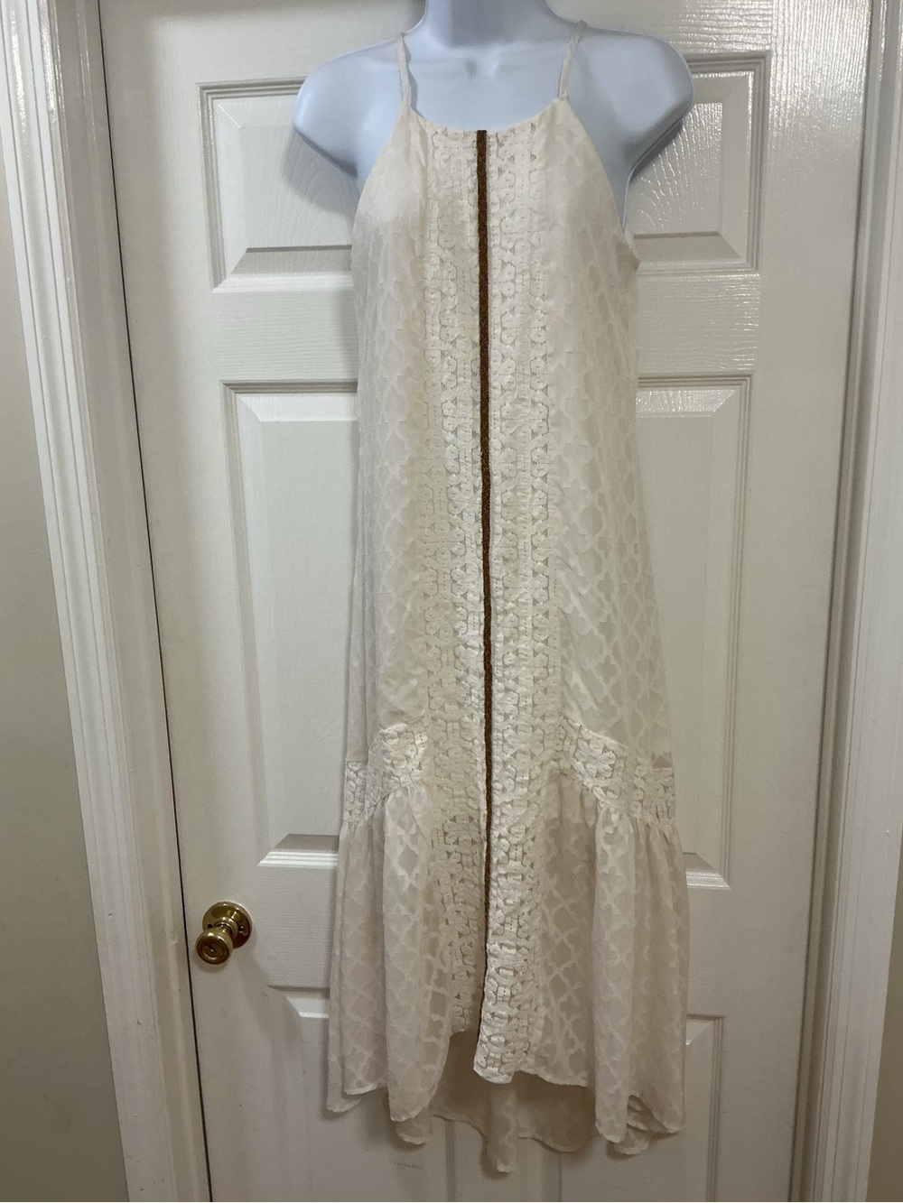Jolt eggshell lace maxi dress features a distinctive brown vertical accent front